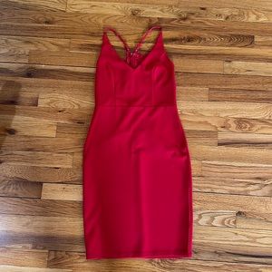 Red dress worn once. small. Lace back.